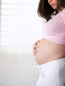 Side profile of a pregnant woman